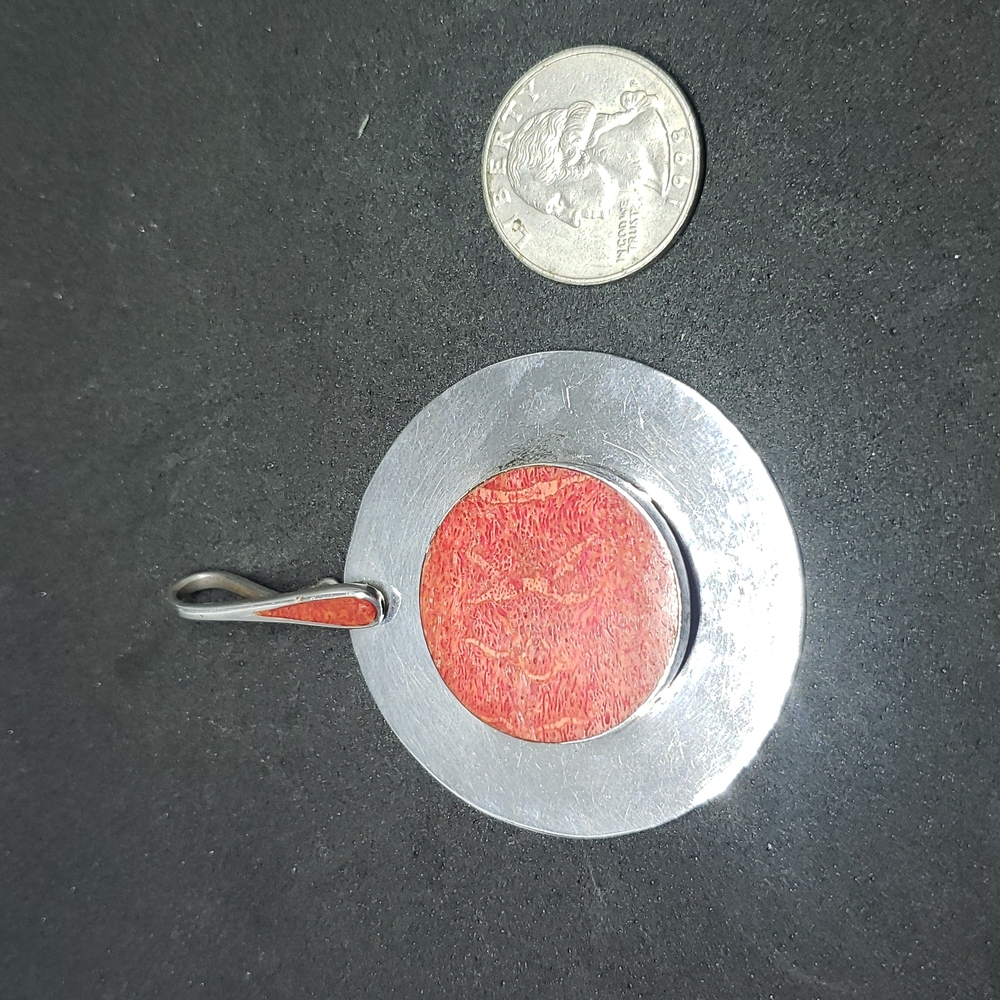 Sterling silver and red stone charm